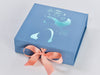 Example of Moonstone Ribbon Featured on Pale Blue Gift Box with Mint Green Custom Foil Logo