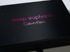 Custom Printed Pink Foil Calvin Klein Logo to Lid of Black Folding Gift Box