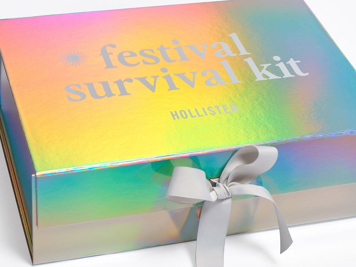 Holographic Rainbow A4 Deep Gift Box with 'festival survival kit' White Screen print with a Silver bow on a white background