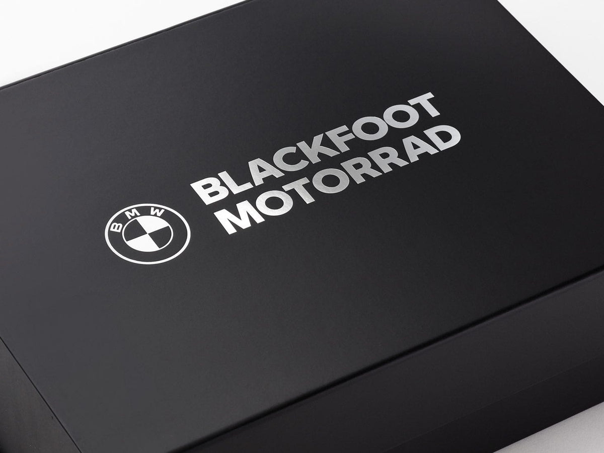 Black box with 'Blackfoot Motorrad' and BMW logo on a white background