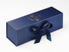 Navy blue gift box with a bow on a white background