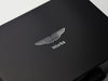 Aston Martin logo on a black gift box