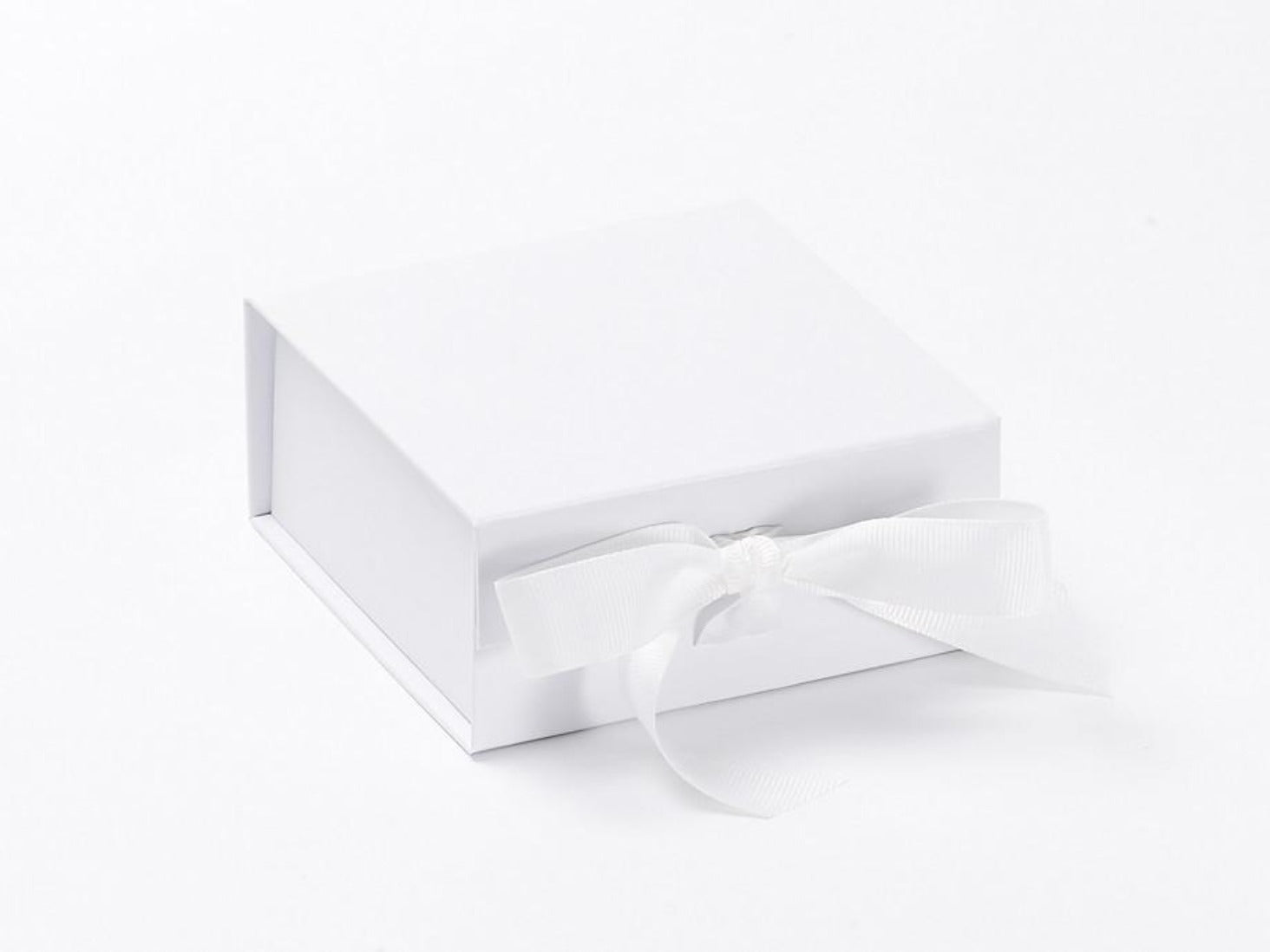 Small white gift box with fixed ribbon ties from Foldabox USA