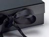 Black folding gift box front ribbon detail from Foldabox