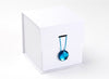 Blue Tourmaline Gemstone Gift Box Closure Featured on Large White Cube Gift Box