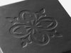 Custom Debossed logo to Lid of Black Gift Box from Foldabox USA