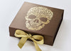 Example of Gold Ribbon Featured on Bronze Gift Box with Custom Gold Design