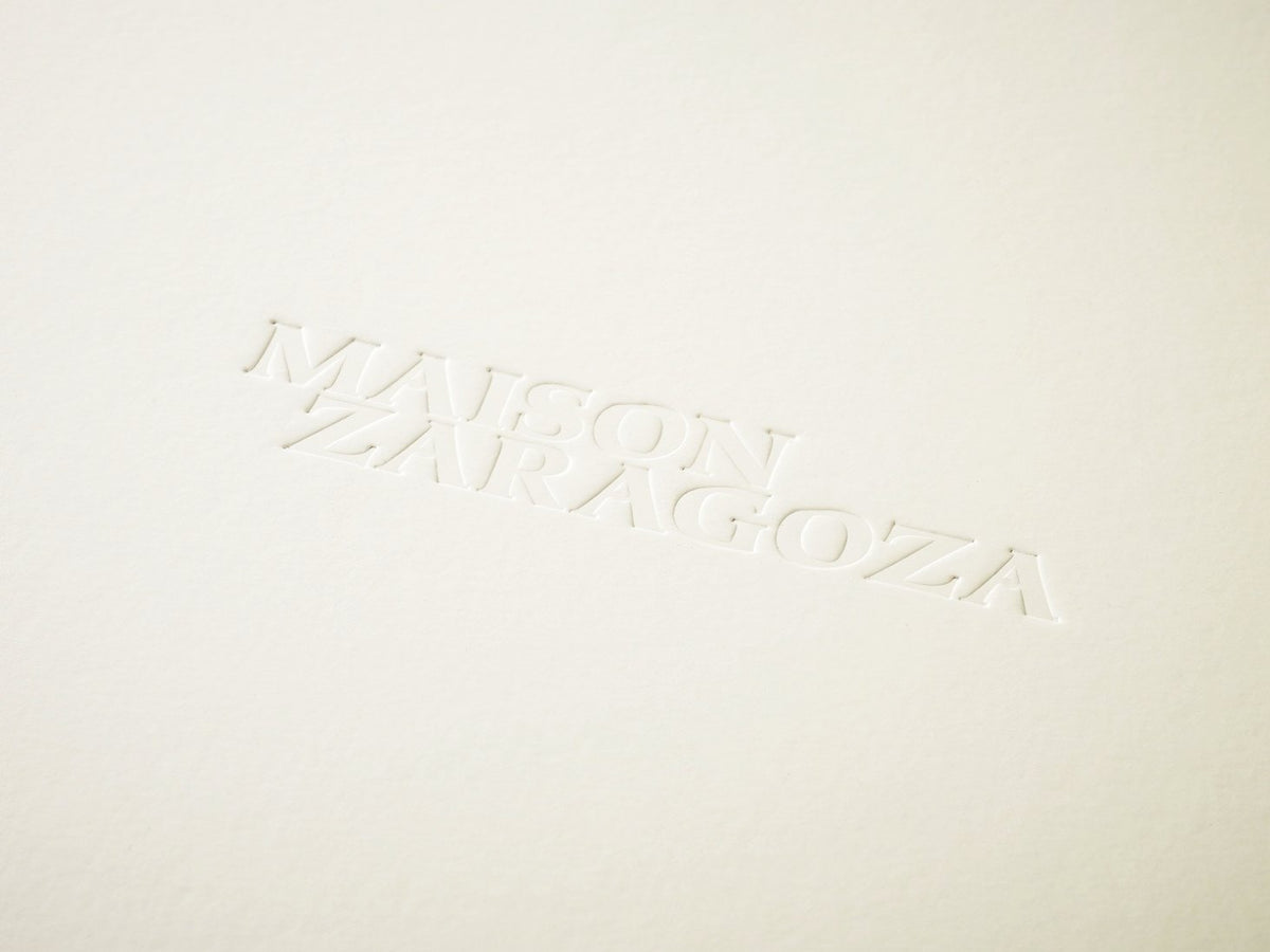 Custom Debossed Logo onto Lid of Ivory Gift Box