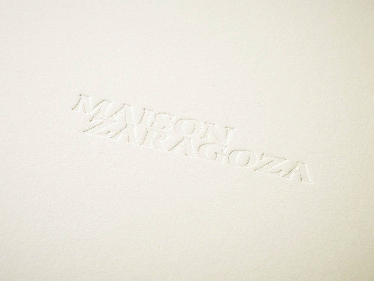 Custom Debossed Logo to Lid of Ivory Folding Gift Box