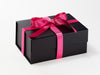 Example of Hot Pink Recycled Satin Ribbon Featured on Black Gift Box