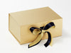 Example of Navy Recycled Satin Ribbon As A Double Bow on Gold Gift Box