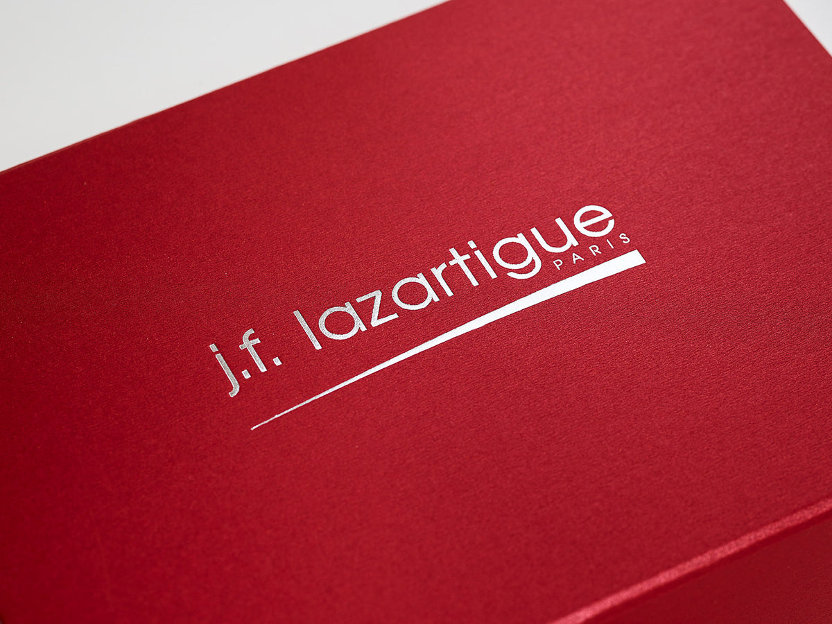 Red folding gift box with custom silver foil logo to lid