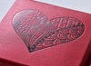 Red folding gift box with custom black foil logo to lid
