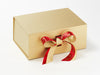 Example of Red Wildwood Recycled Ribbon Featured As a Double Bow on Gold Gift Box