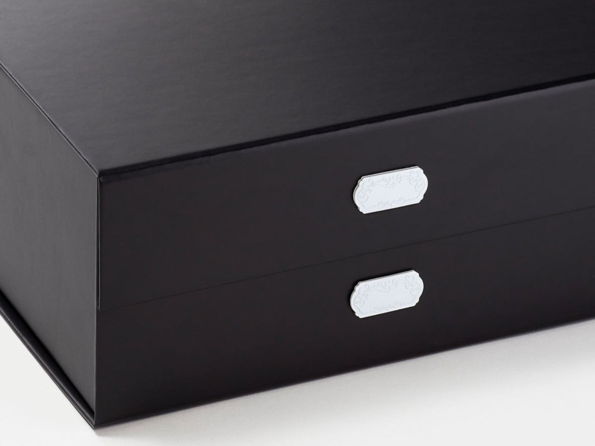 Example Of White Slot Decal Labels Featured on Black Gift Box